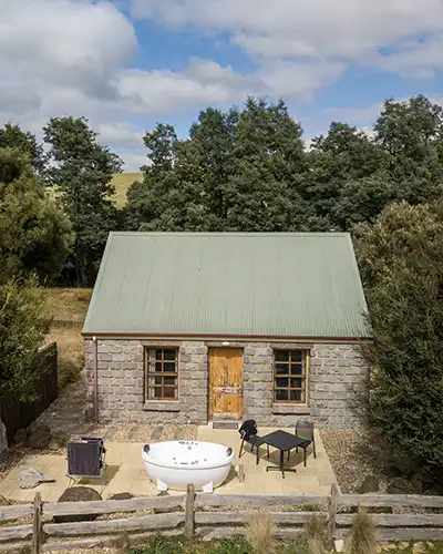 Ah Back studio cottage is a bluestone cottage at Tin Dragon Cottages in North east Tasmania
